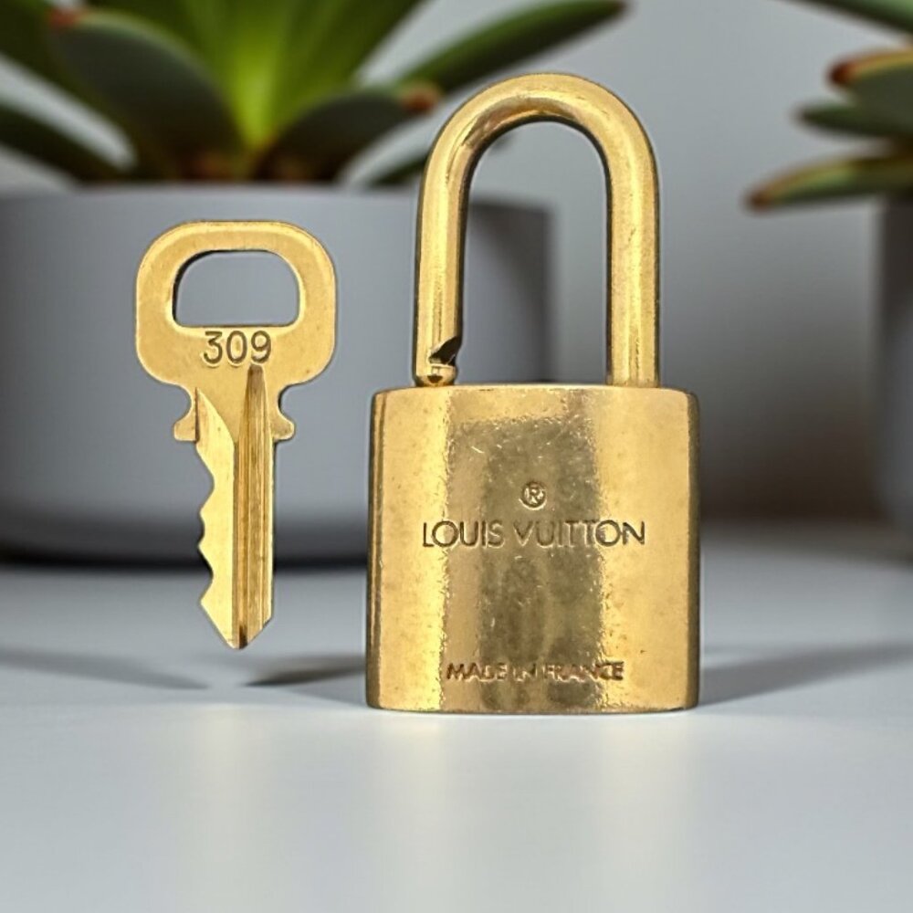Louis Vuitton Gold Padlock and Key Set 309